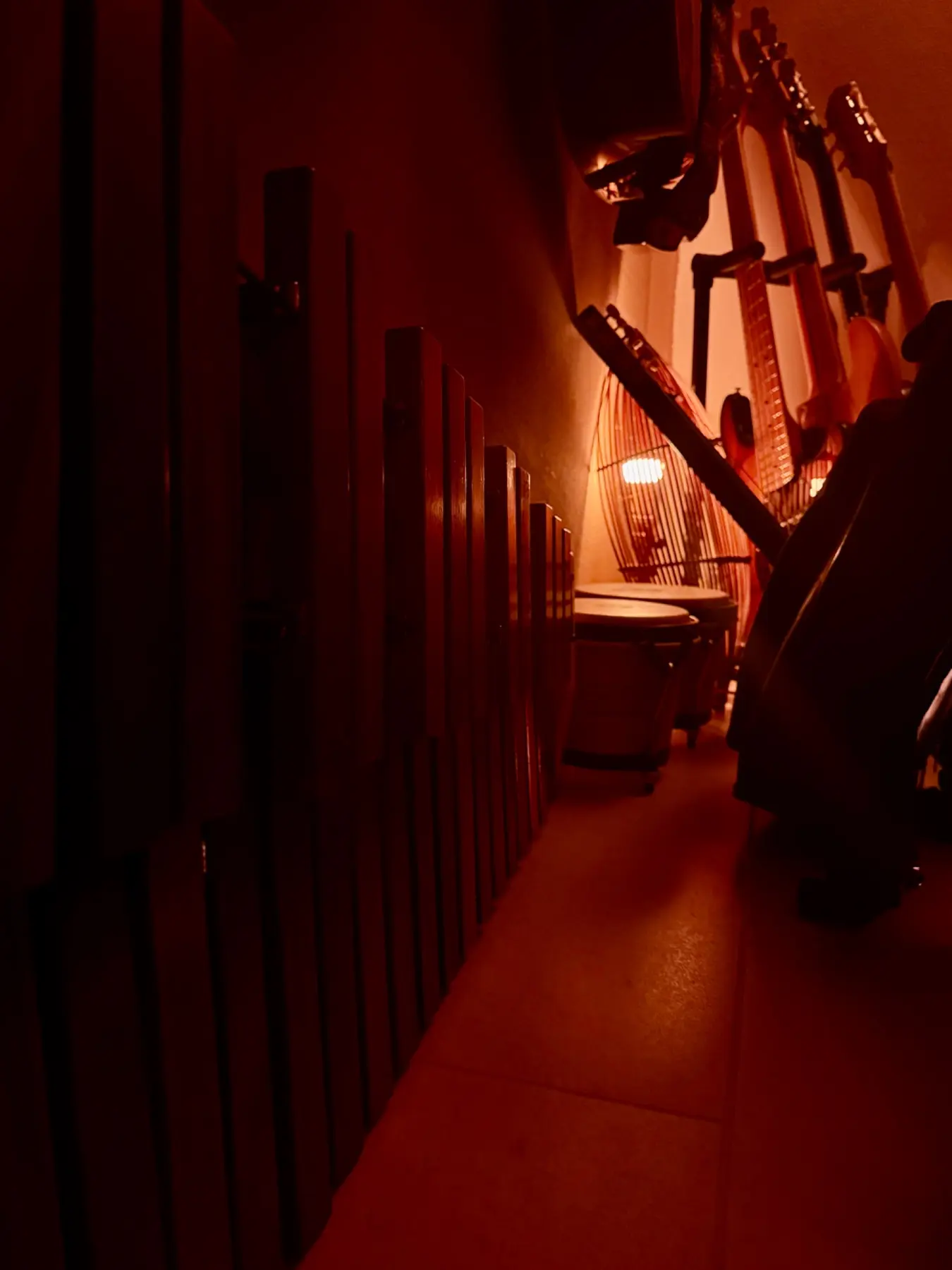 Dark studio corridor beside a keyboard at night