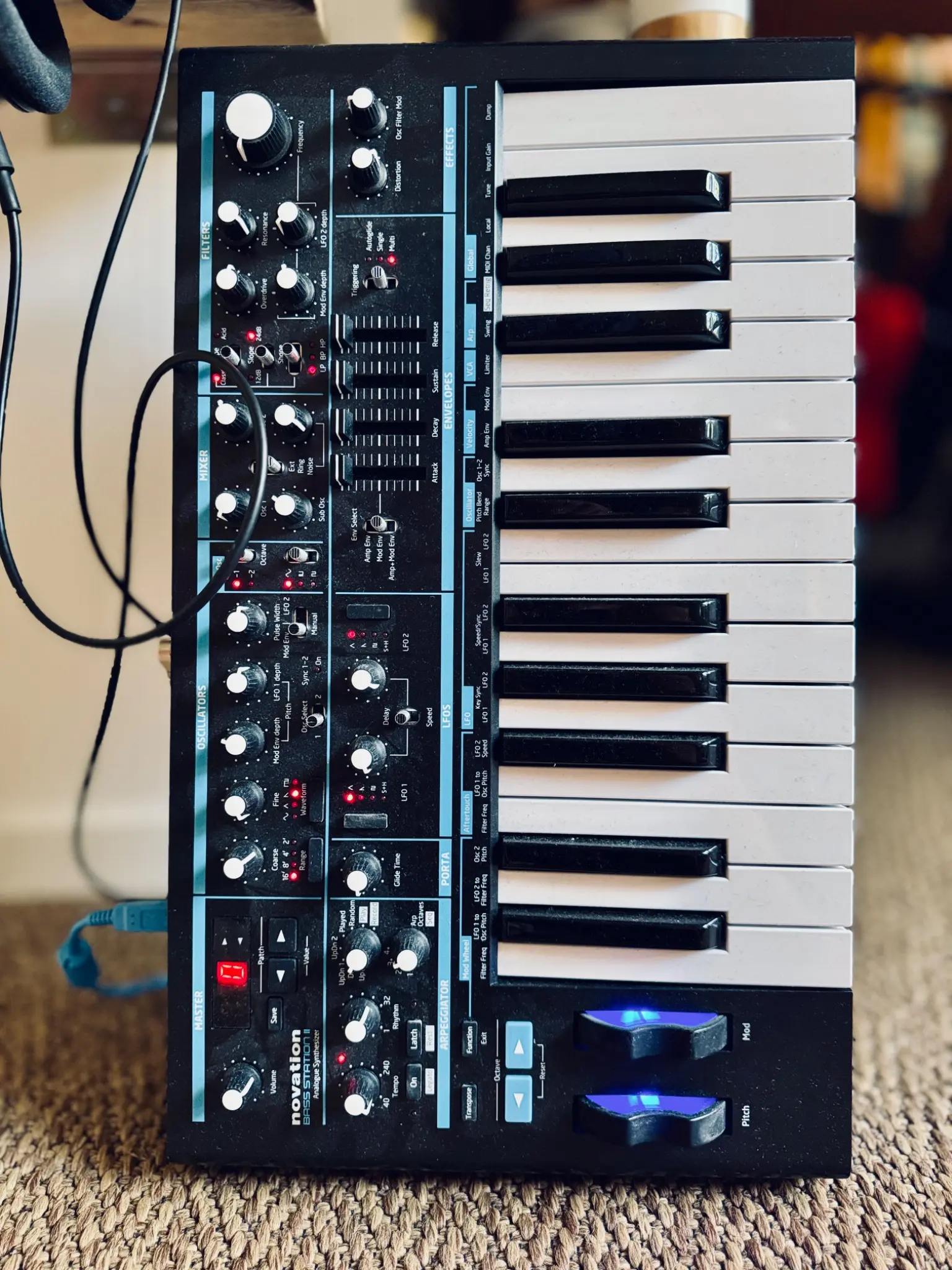 Analog synthesizer with illuminated controls and keyboard
